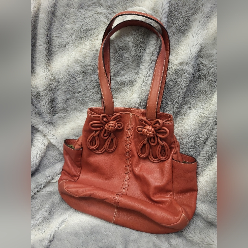 Red Firenze Bella purse.